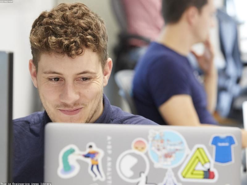 QA and testing — engineers reviewing test results on screens